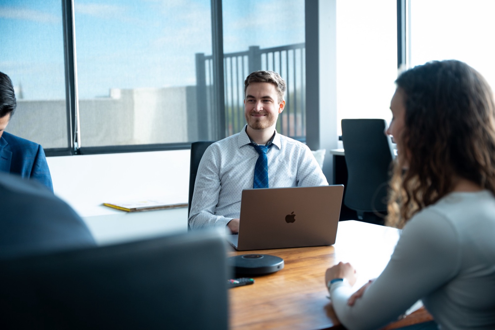 InfoLink team members in a meeting